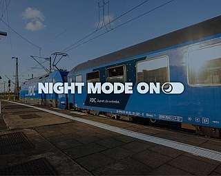 Ein Foto von einem Zug mit Lok und Liegewagen mit dem Schriftzug "Night mode on"