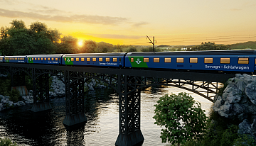 Der SJ EuroNight fährt bei Sonnenuntergang über eine Brücke.