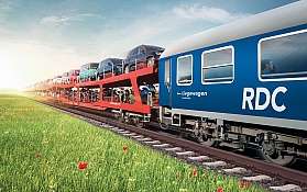 Ein Visual eines Zugs mit Liegewagen und Auto-Transportwagen.